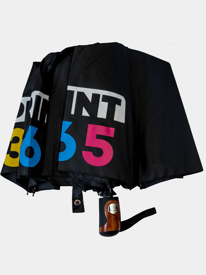 Black umbrella with colorful text on a white background