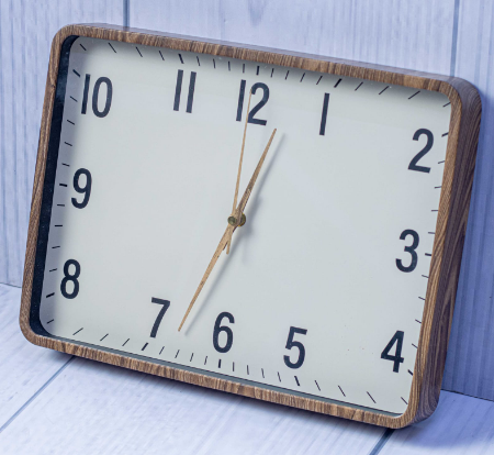 Custom laser-printed rectangular wood grain wall clock with rounded corners by Print365 Kenya