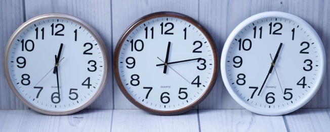 Custom laser-printed executive large wall clock in gold, walnut brown, and white frames by Print365 Kenya