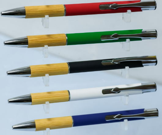 Custom laser-engraved bamboo wood and metal hybrid pens with silver chrome trim by Print365 Kenya