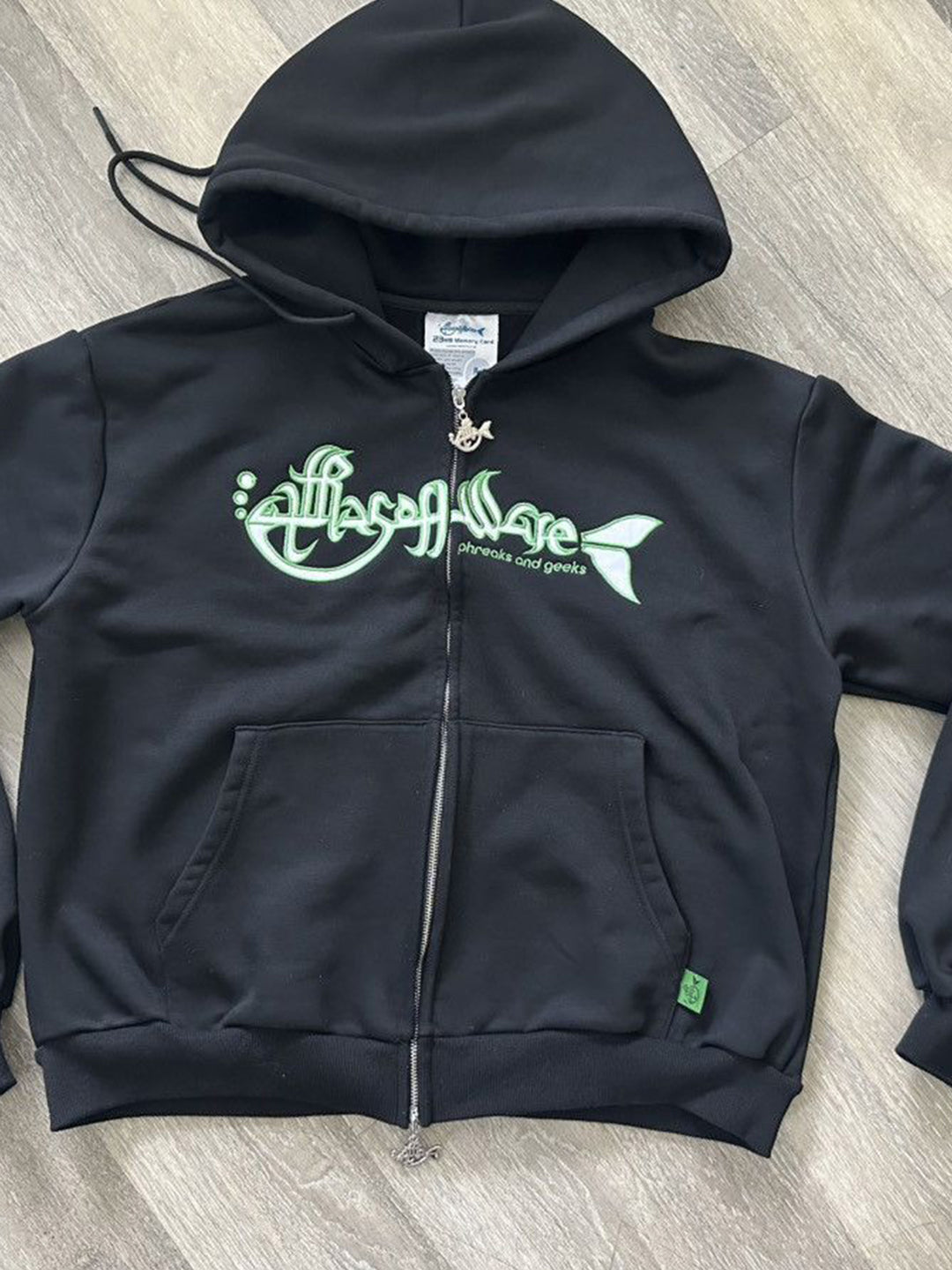 Black zipped hoodie branding at the front 