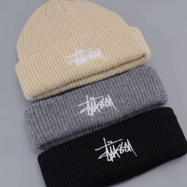 Custom beanies in brown, grey, and black by Print365 Nairobi