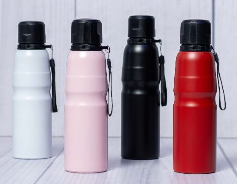 Display of powder-coated sports water bottles with ergonomic grip by Print365 Kenya