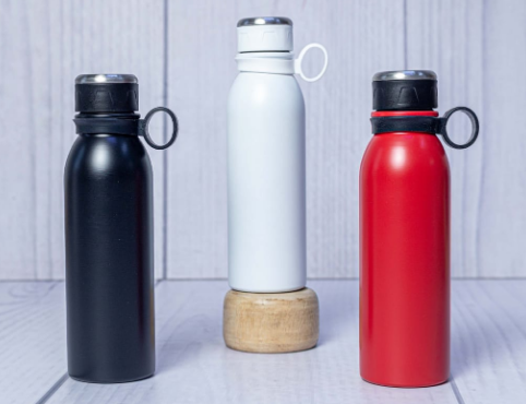 Display of powder-coated metal sports water bottles with carry ring loop by Print365 Kenya