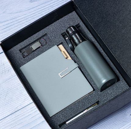 Custom laser-engraved executive 4-in-1 corporate gift set in grey with matte black box by Print365 Kenya