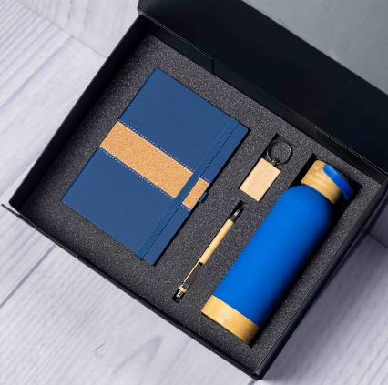 Custom laser-engraved eco bamboo 4-in-1 corporate gift set in blue by Print365 Kenya