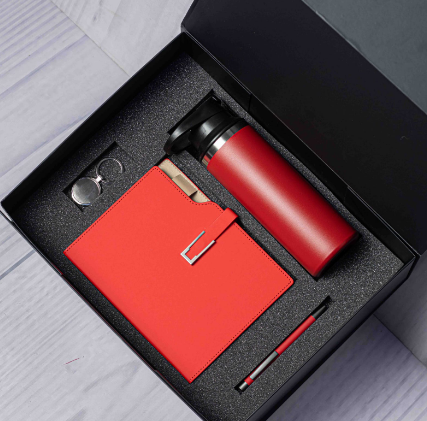 Custom laser-engraved executive 4-in-1 corporate gift set in red with thermal tumbler by Print365 Kenya
