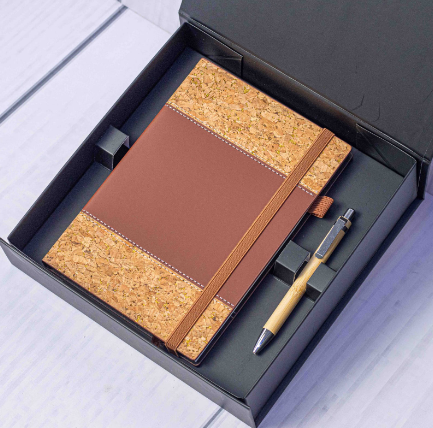 Custom laser-engraved eco notebook and pen gift set in brown by Print365 Kenya