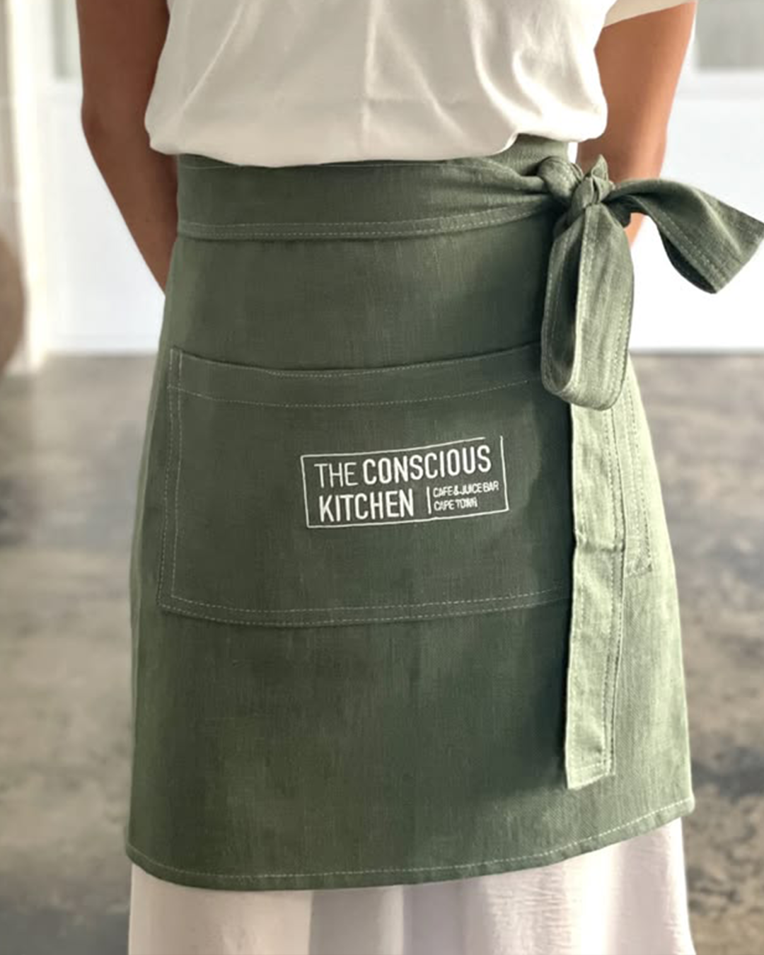 Branded hospitality half aprons printed by Print365 Nairobi