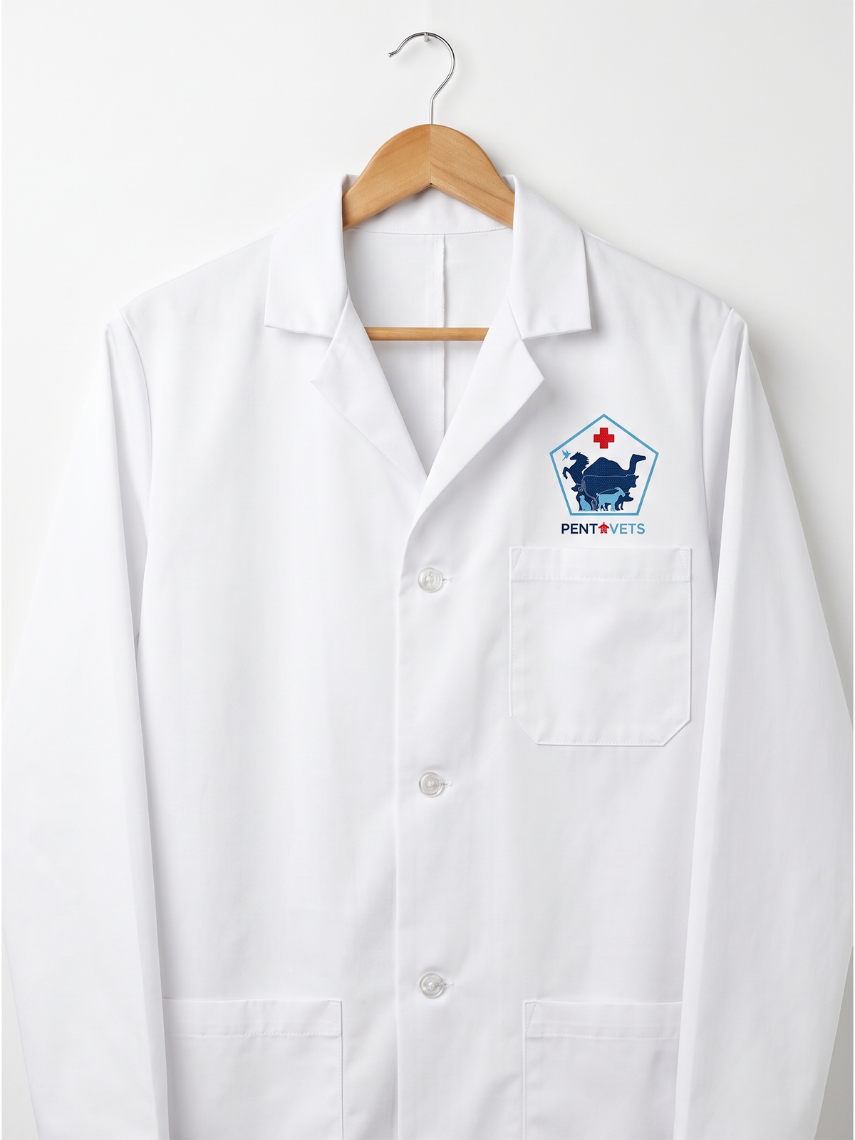 Custom embroidered white lab coat made of 65/35 poly-cotton twill with hospital chest logo done in Nairobi