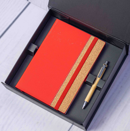 Custom laser-engraved eco notebook and pen gift set in red by Print365 Kenya