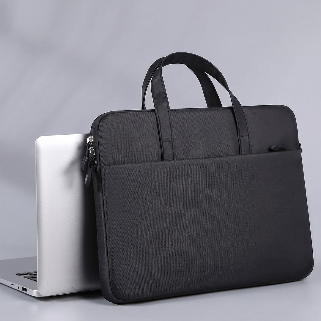 Custom laptop sleeve next to laptop done by Print365 Nairobi