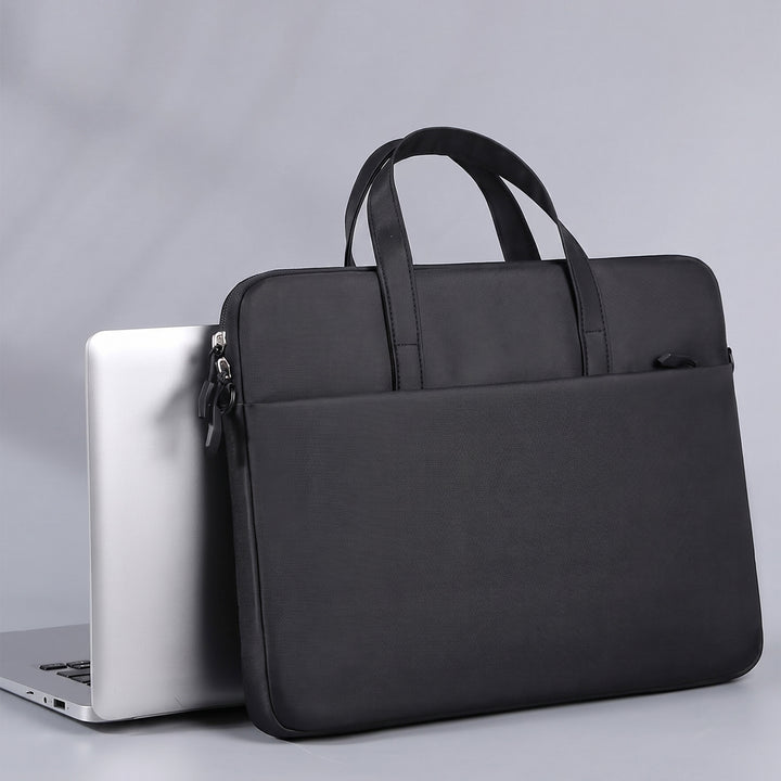 Custom laptop sleeve next to laptop done by Print365 Nairobi
