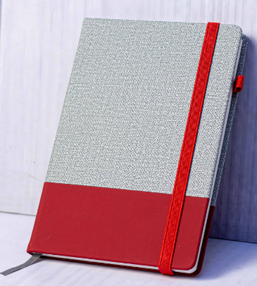 Custom branded A5 grey fabric and red leatherette hybrid notebook by Print365 Kenya