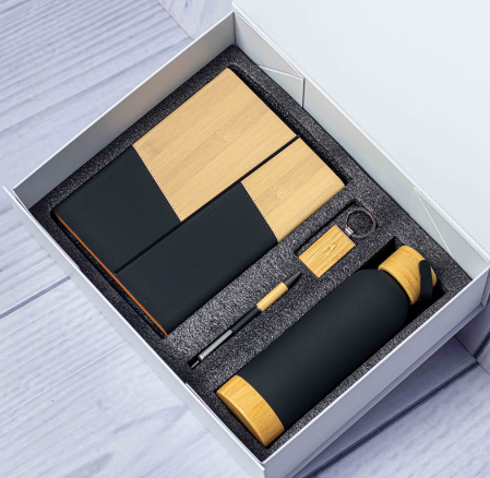 Custom laser-engraved eco bamboo 4-in-1 corporate gift set in black by Print365 Kenya