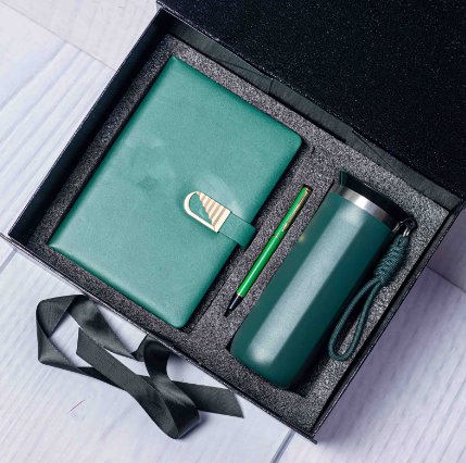 Custom laser-engraved executive 3-in-1 corporate gift set in forest green with stepped gold buckle notebook by Print365 Kenya