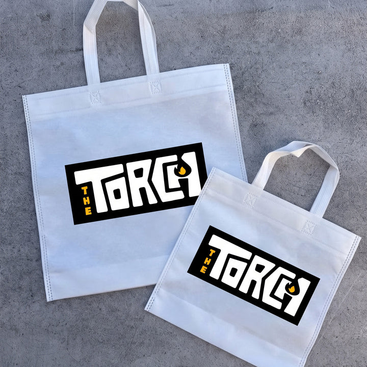 Side-by-side view of custom branded white Kraft paper, non-woven, and laminated shopping bags done by Print365 Kenya