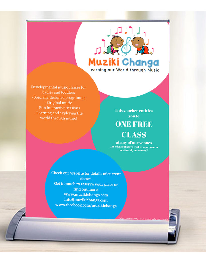 Compact table top mini roll-up banner for reception desks and counter displays