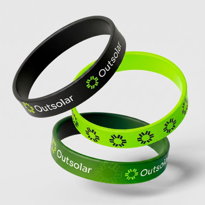 Three customized silicone wristbands stacked in a fan arrangement done in Nairobi, Kenya